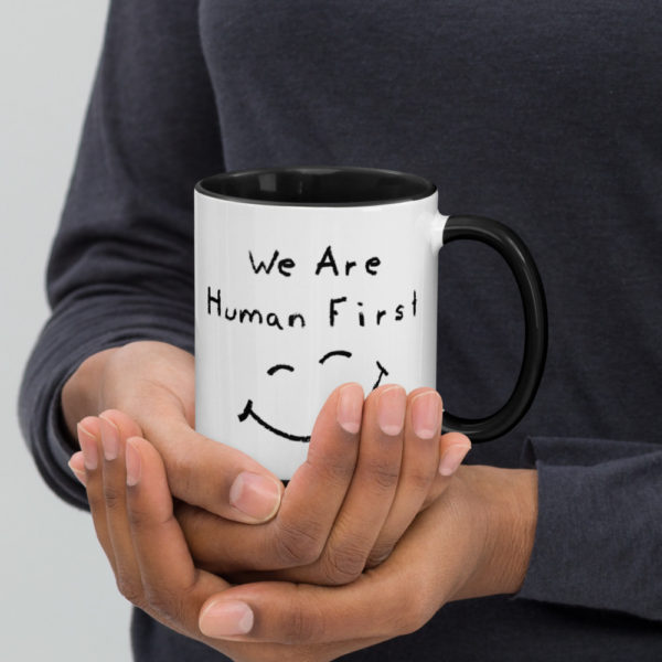 We Are Human First - Mug with Color Inside